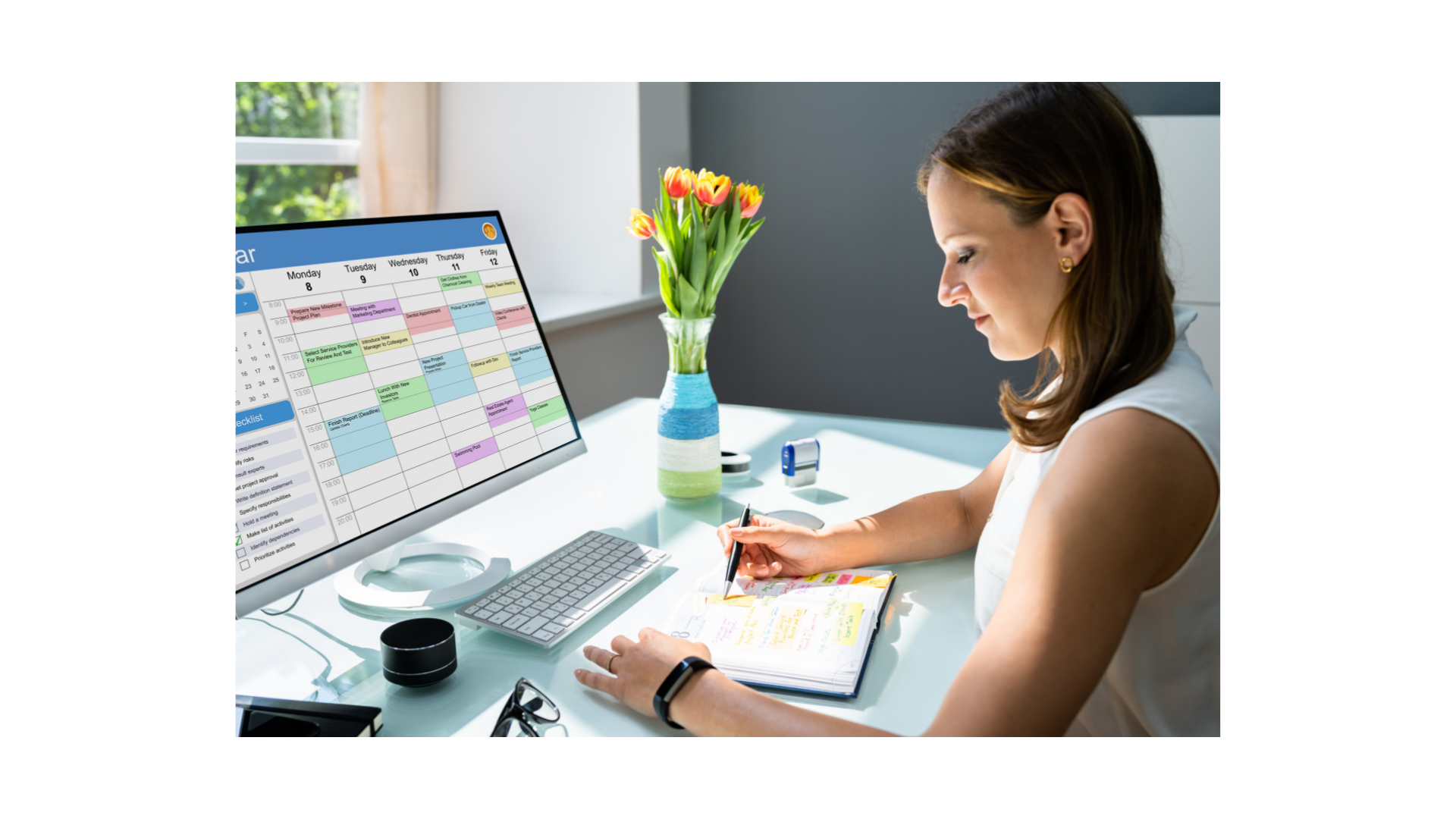 Office manager scheduling jobs on a shared calendar